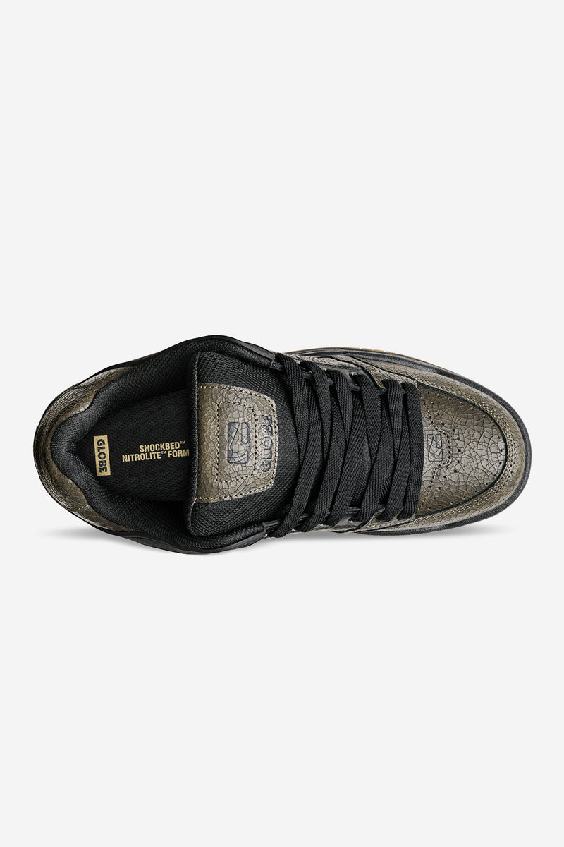 Tilt distressed leather sneaker close up from top with cracked olive leather and black laces.