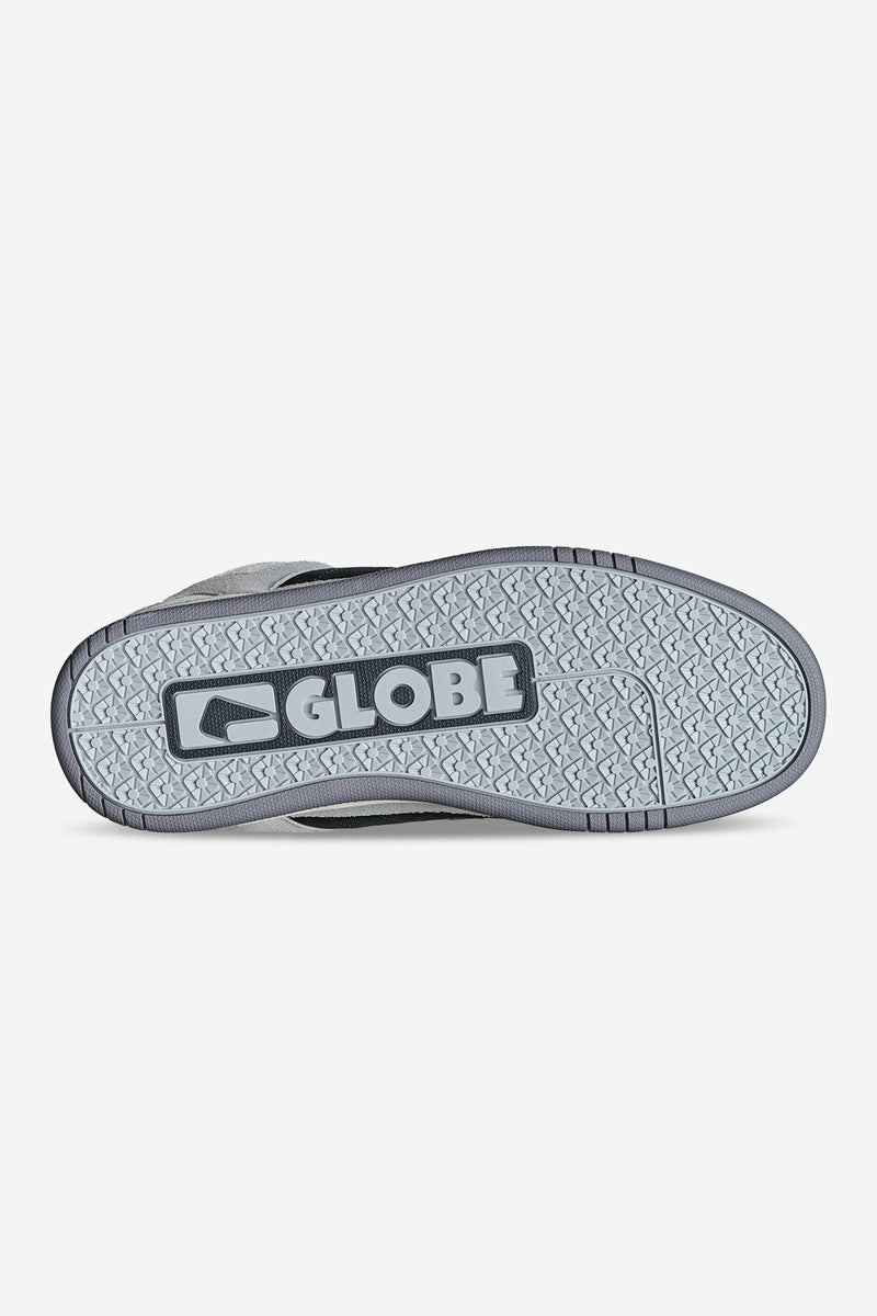 Bottom view of Tilt Prime grey skate shoe with a patterned sole and Globe branding