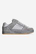Side profile of Globe Tilt Smoke sneaker in grey with embossed branding and gum sole