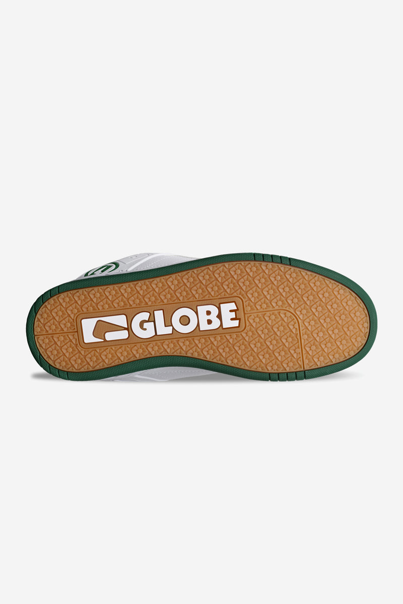 Bottom view of Tilt shoe featuring a tan gum outsole with large Globe logo and geometric tread.