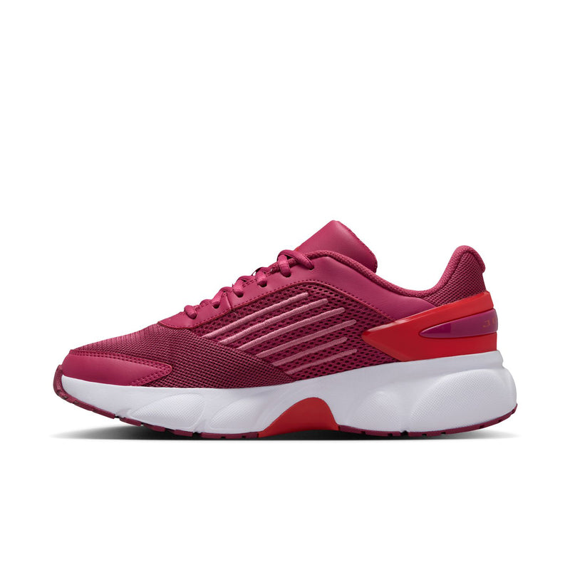 Women’s berry pink low-top running shoes with mesh upper, laces, and red heel panel
