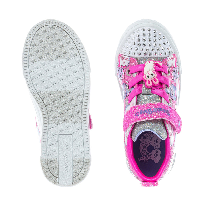 Toddler sneaker sole and top view; pink glitter upper with bow detail and silver studs