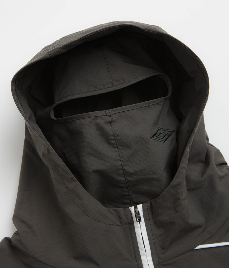 Umbro Guarding Masked Tracksuit Jacket in White and Dark Olive