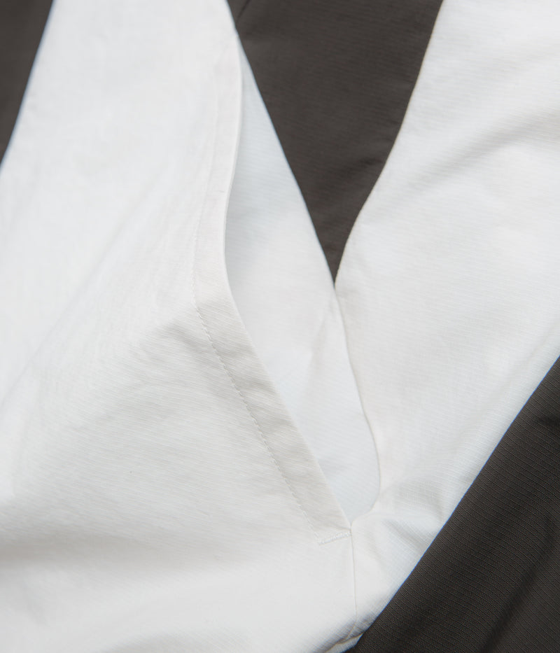 Umbro Guarding Masked Tracksuit Jacket in White and Dark Olive