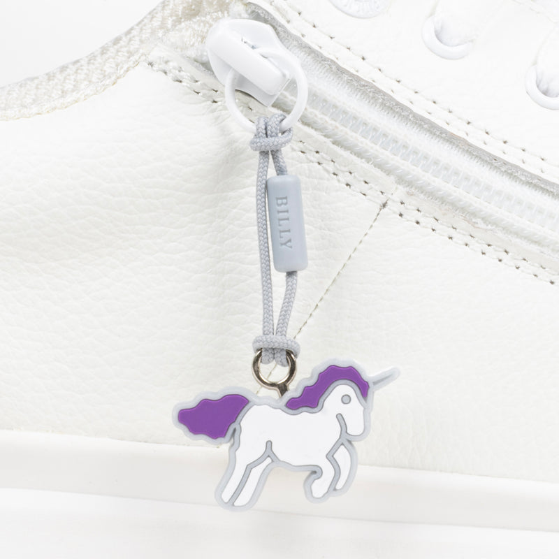 White shoe with a unicorn zipper pull on a white background