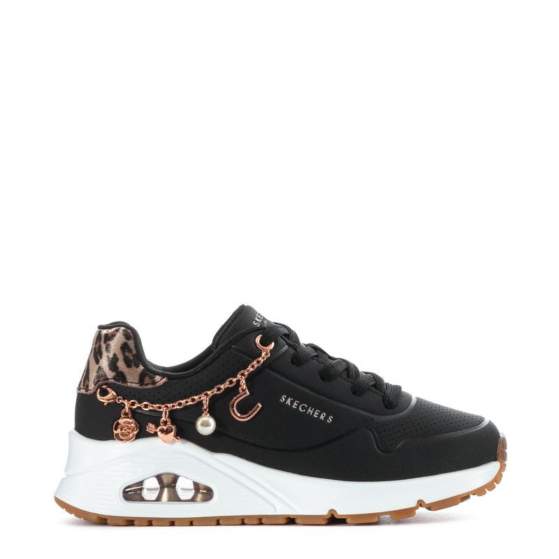 Kids black low-top sneakers with rose-gold charm bracelet chain and leopard heel accents