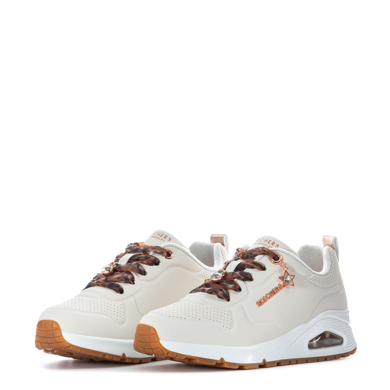 Kids white sneaker pair, front view, with leopard-print laces and tan rubber sole