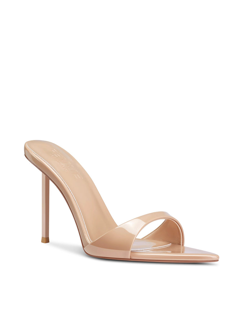 Femme LA Whiskey 100 in Nude – front three-quarter view showing wide patent vamp strap, open pointed toe, and Femme LA branded insole