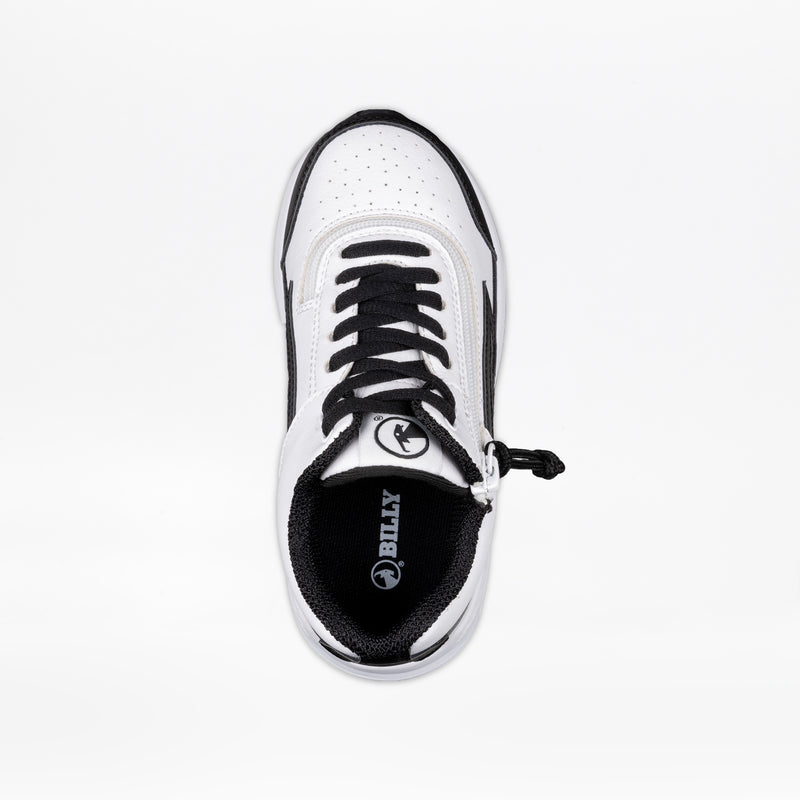 Top view of the White/Black BILLY Goat Hoop by BILLY Footwear, a kids’ AFO-friendly shoe with black laces, black trim, and logo on the insole. Features a partially open side zipper and is set against a plain white background.