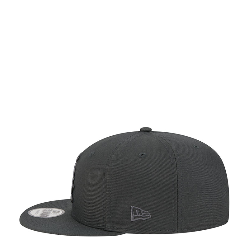 Dark gray baseball cap with New Era flag emblem on front panel.