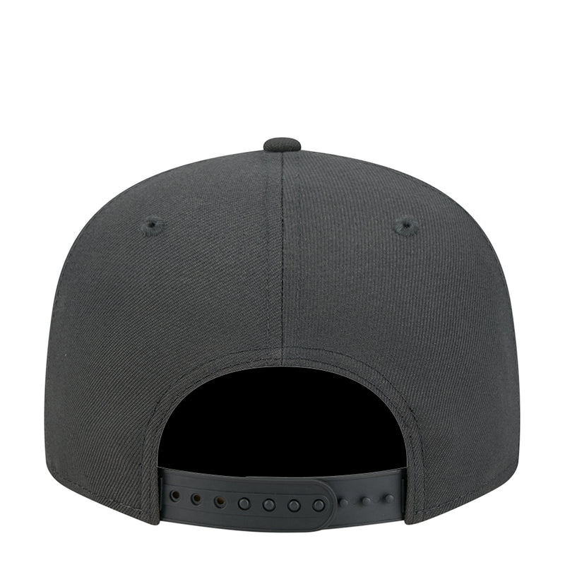 Dark gray baseball cap with snapback strap visible at the back opening.