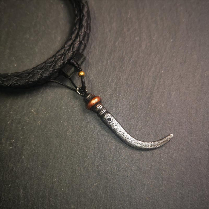 Wolf Tooth Amulet 1.77" - Tibetan Buddhist amulet, front view