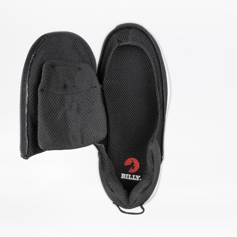 The Women's Black BILLY Limitless by BILLY Footwear features a side and top zipper for easy-on/easy-off access, adjustable depth, and reveals the red BILLY logo on the insole.