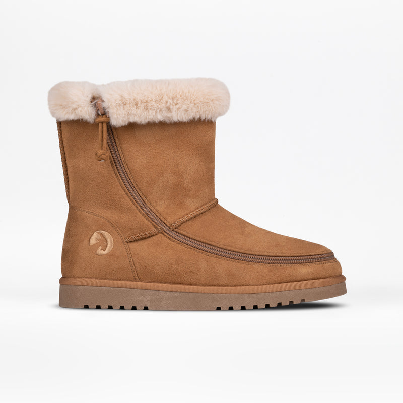 The Women's Chestnut BILLY Cozy II by BILLY Footwear features tan suede, plush light beige fur lining at the top, and a flat rubber sole, shown against a white background.
