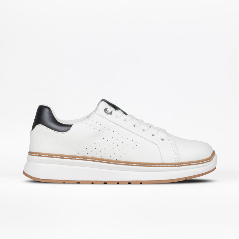 The Women's White Leather BILLY Comfort Luxe sneaker by BILLY Footwear features a black heel tab, perforated sides, white laces, and a brown-accented sole. Displayed on a white background, these sensory-friendly shoes are ideal for everyday comfort and style.