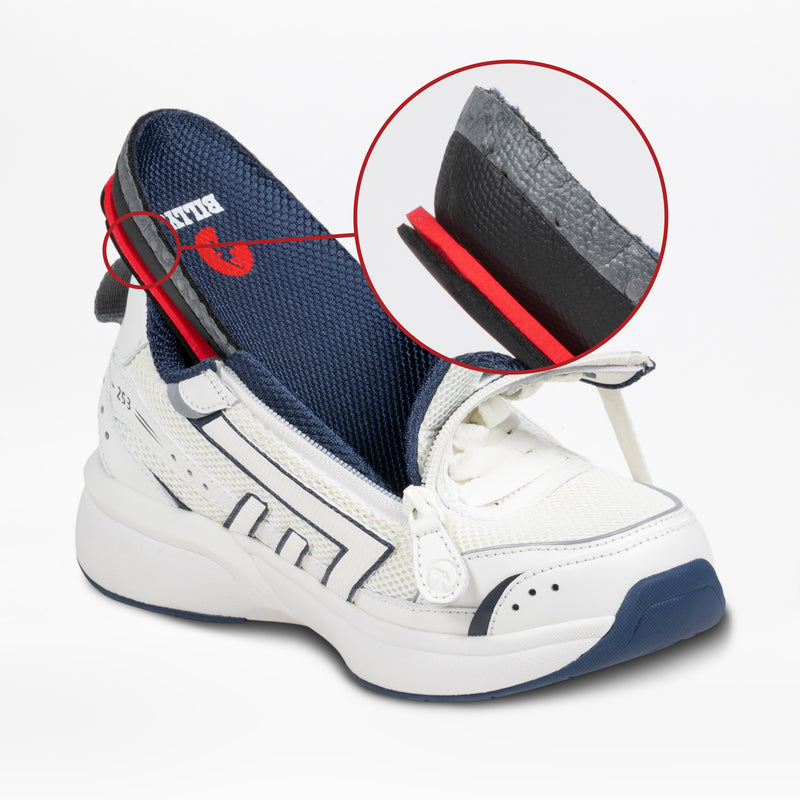 A Women’s White/Navy BILLY Limitless 253 sneaker by BILLY Footwear is cut open, revealing the layered materials in its heel and sole, while a red circle highlights these inner features of this sensory-friendly shoe.