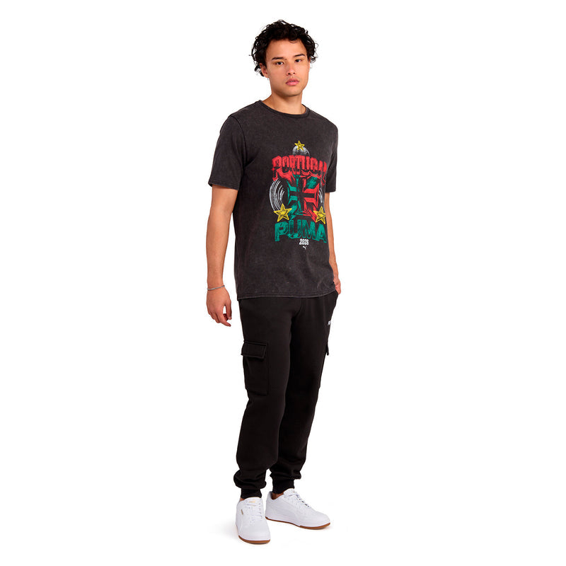 Mens dark heather charcoal graphic tee worn with black pants and white sneakers