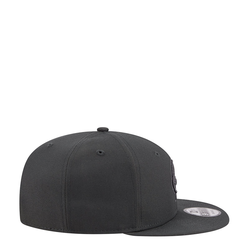 Dark charcoal baseball cap with tonal side patch and curved brim