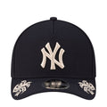 Navy baseball cap with white Yankees logo embroidery on the front panel