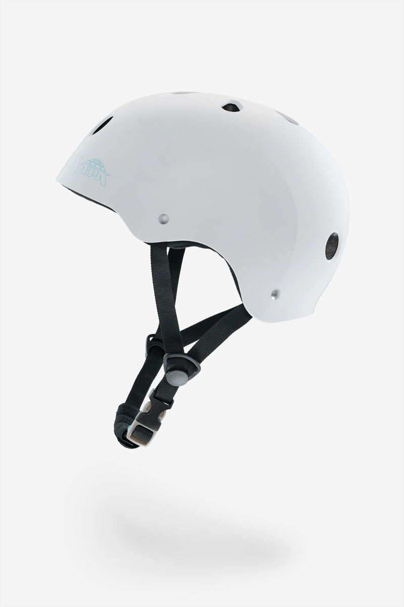 Side view of white gloss YEPA T-Shell helmet showing smooth shell, black interior padding and adjustable chin strap