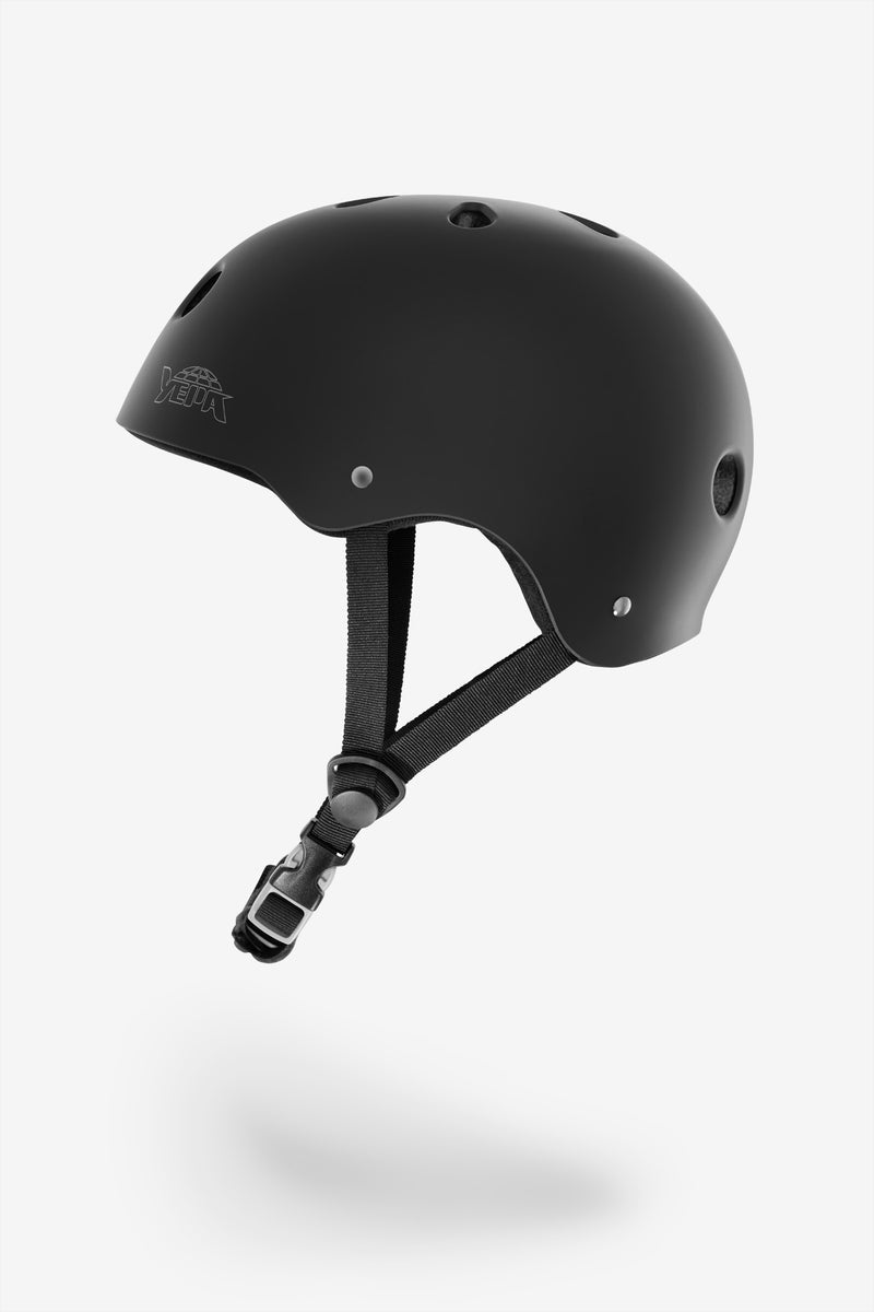 YEPA T-Shell helmet matte black side angle with logo and adjustable chin strap visible