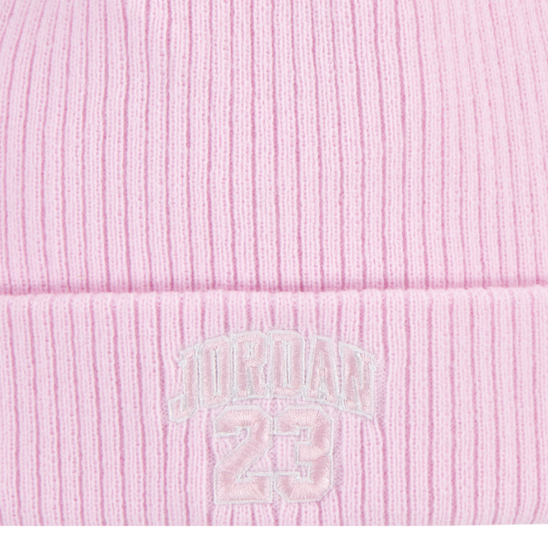 Pink ribbed knit beanie with raised Jordan logo patch on cuff