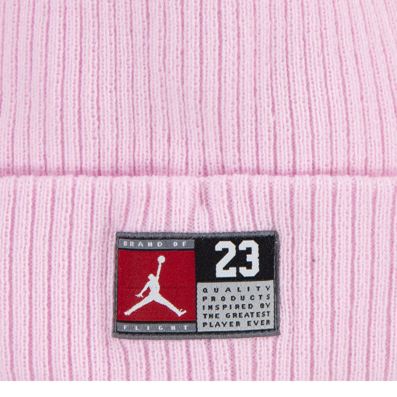 Pink beanie brand label patch with Jordan 23 graphic on cuff