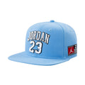 Youth blue Jordan flat brim snapback cap with raised JORDAN 23 logo front patch