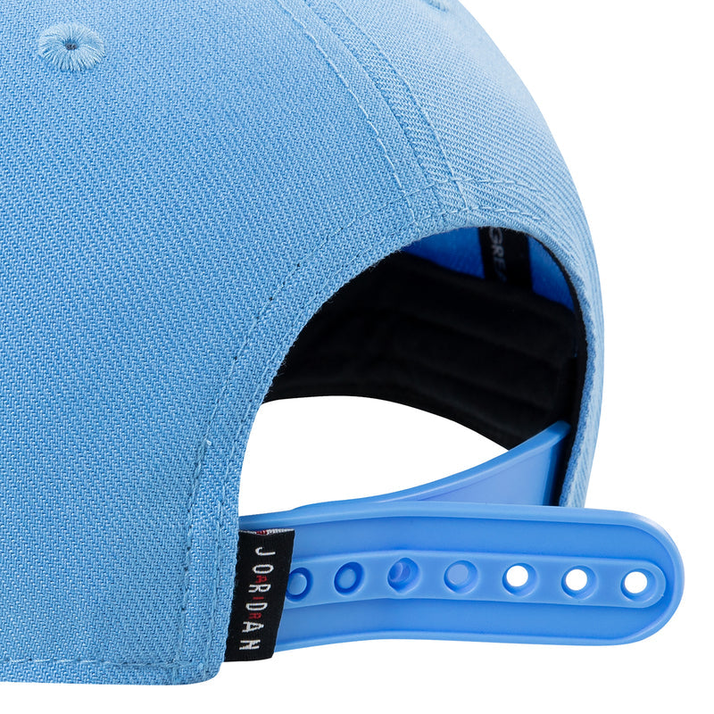 Youth blue snapback cap back strap with blue plastic adjustable piece